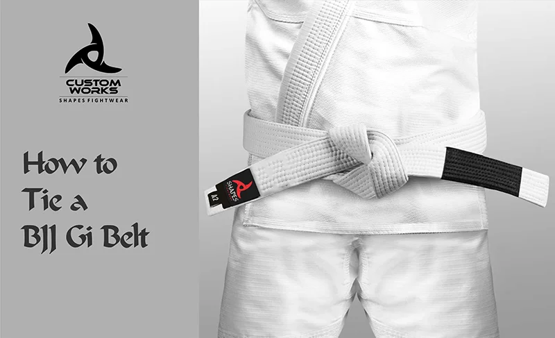 How to tie a BJJ Gi belt step-by-step, showing a student in a white Gi demonstrating proper wrapping and knotting techniques.